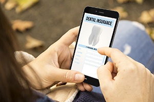 Using mobile device to look up dental insurance information