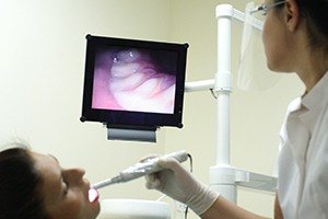 Dentist capturing intra oral photos
