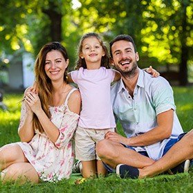 Mother father and child outdoors