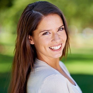 Woman with gorgeous smile outdoors