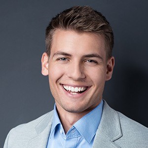 Young man with healthy attractive smile