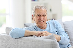 Man with dentures in Lakewood smiling