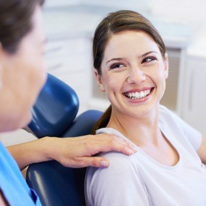 Smiling woman in dental chair