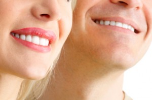 smiling couple with porcelain veneers