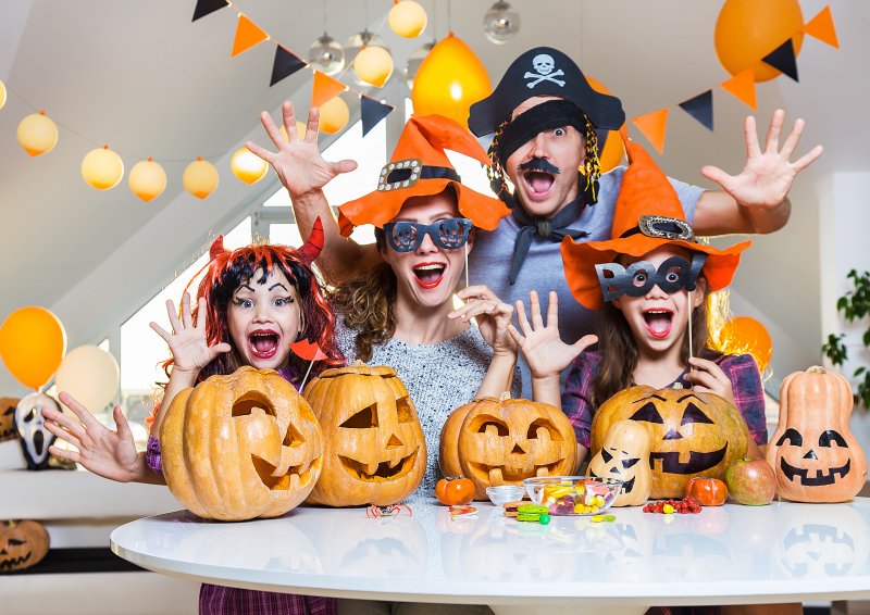 A family enjoying Halloween with good teeth