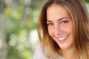 A smiling woman.